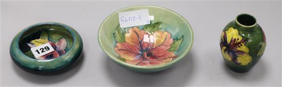 A Moorcroft Hibiscus a dish, a bowl and a vase largest diameter 14cm
